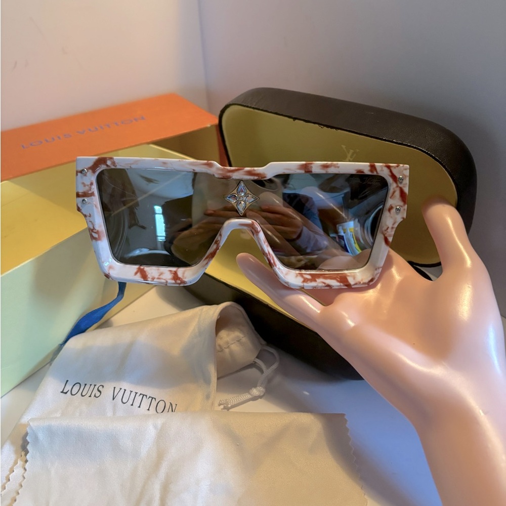 Heat damaged. Sunglasses “Cyclone” $855! Comes w sunglasses & case